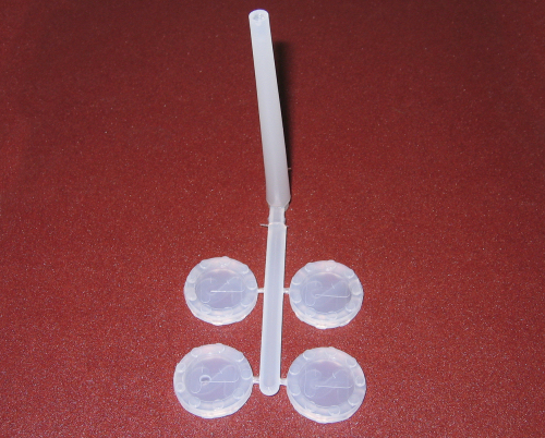 Checkers with Sprue Attached